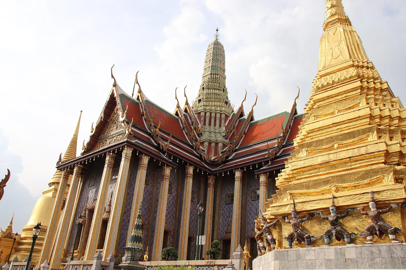 Golden chedi and spires of Wat Phra Kaew inside the Grand Palace, Bangkok
