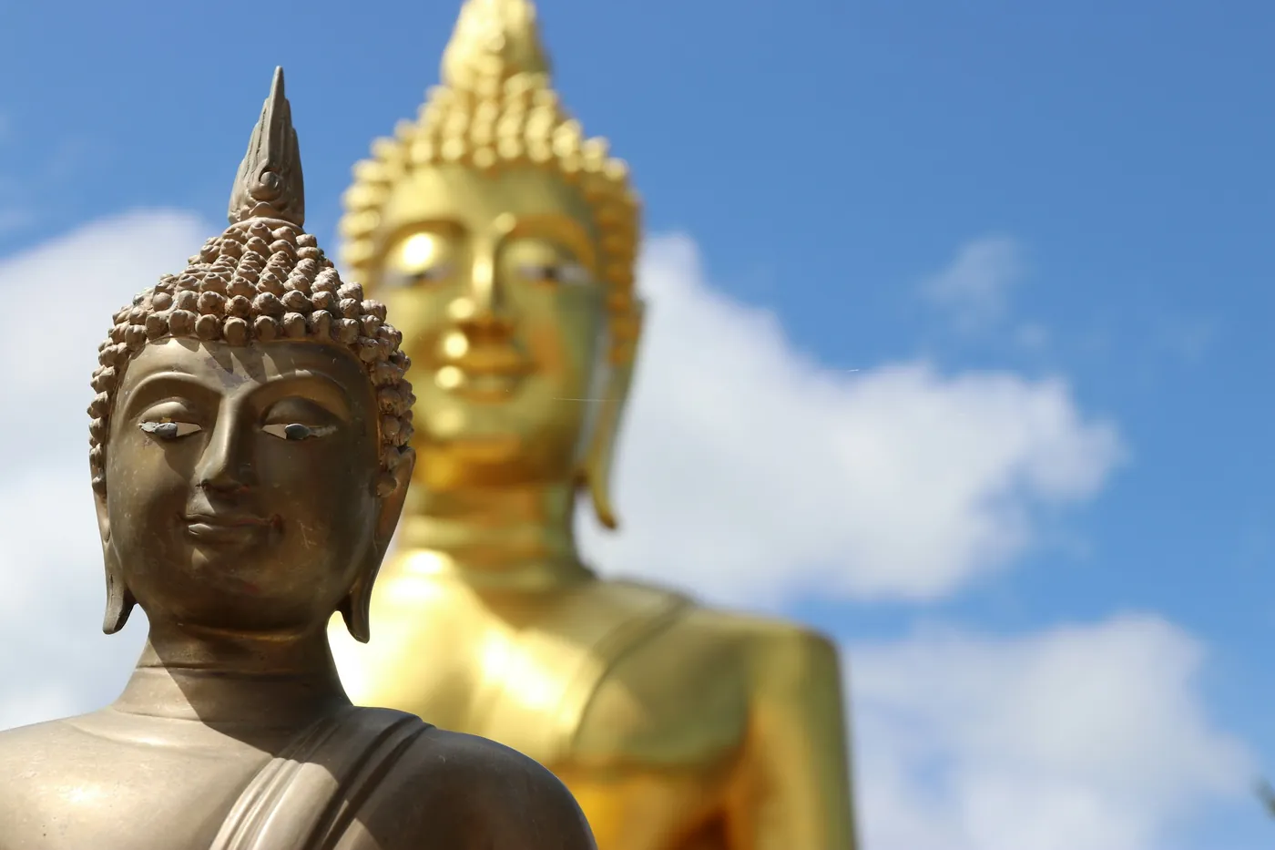 Big Buddha Pattaya with a smaller bronze Buddha in front