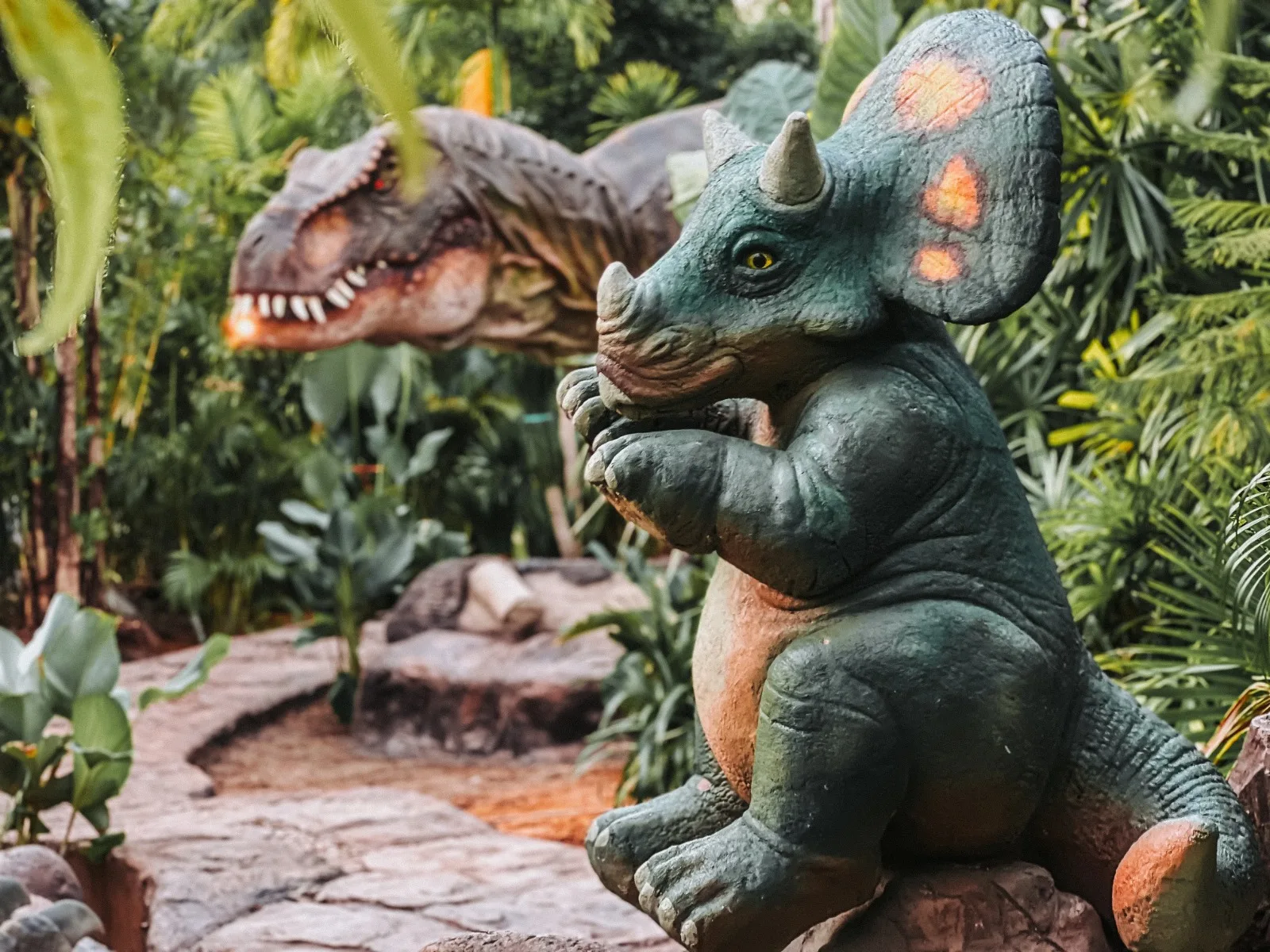 Dino Park Phuket lit up in the evening between Karon and Kata beaches