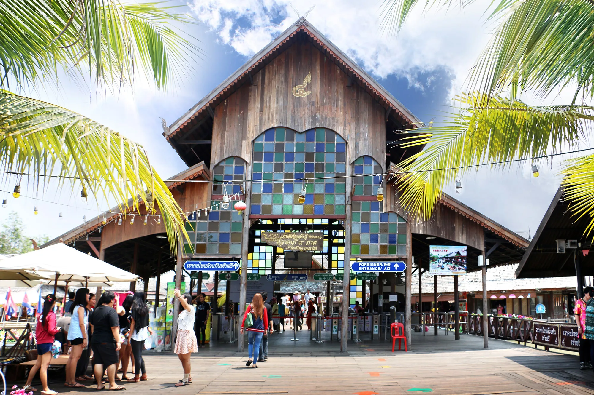 Traditional boats and stalls at Pattaya Floating Market