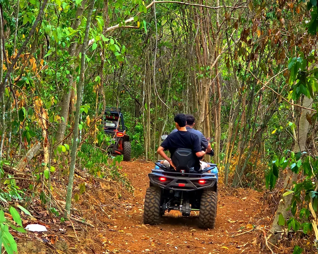 ATV and buggy on the red-earth off-road track at Jungle ATV Ride Pattaya