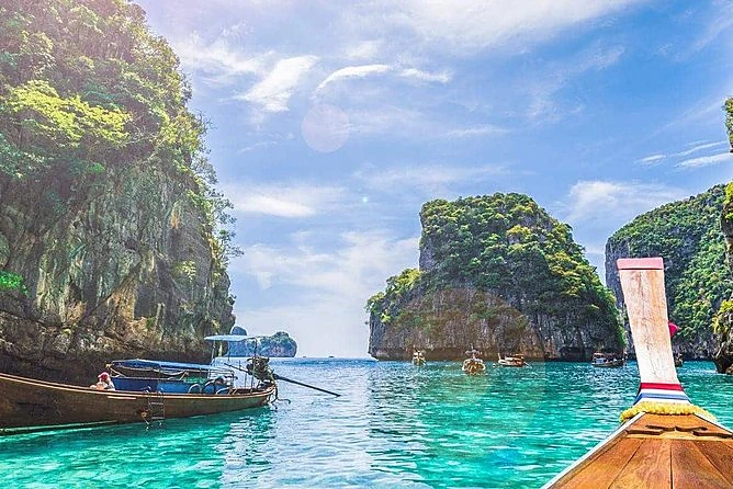 View from a longtail boat bow towards the karst islands of Phi Phi